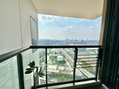 Stunning cityscape view from a modern high-rise balcony, perfect for urban living.