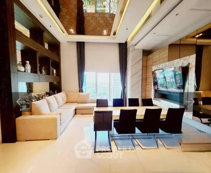Luxurious modern living room with elegant decor and large windows offering city views.