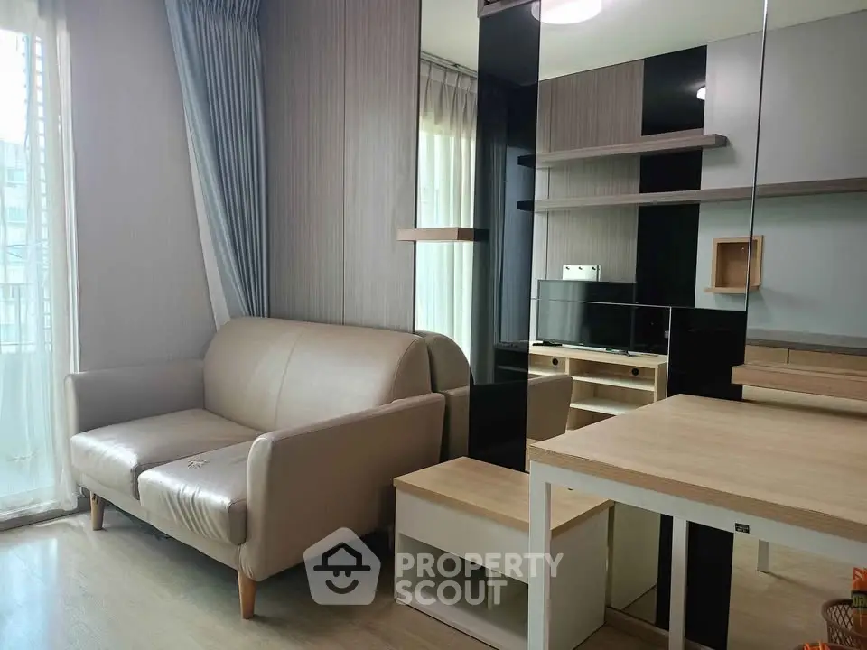 Modern living room with sleek furniture and natural light