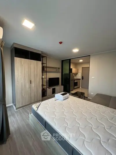 Modern bedroom with built-in wardrobe and cozy ambiance