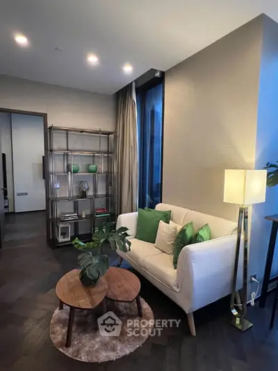 Stylish modern living room with elegant decor and cozy seating area.