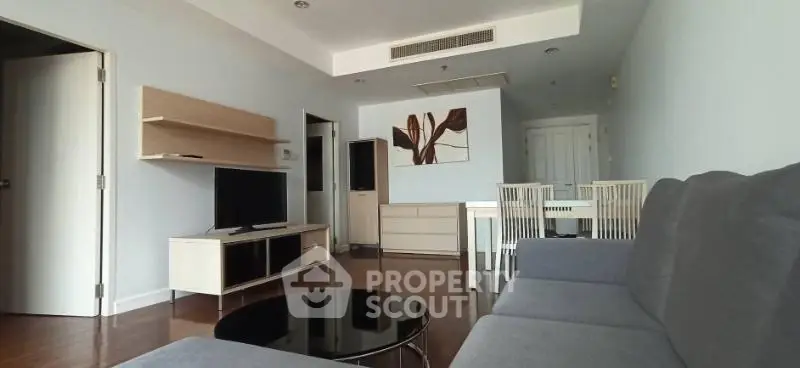 Spacious modern living room with sleek furniture and elegant decor