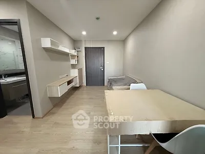 Modern minimalist apartment interior with wooden flooring and sleek furniture