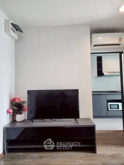 Modern living room with sleek TV stand and stylish decor