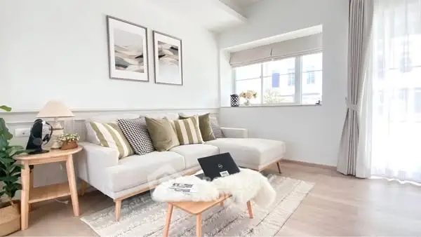 Bright and airy living room with modern decor and large windows