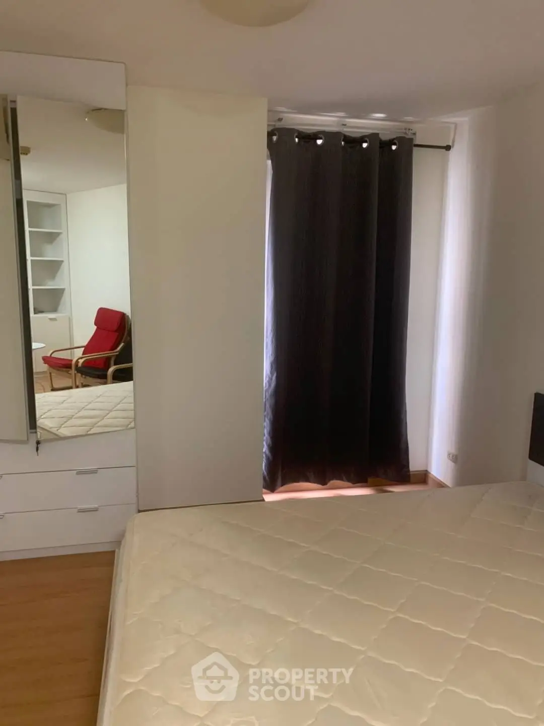 Modern bedroom with sleek design and cozy ambiance