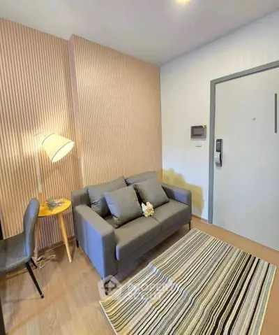 Cozy living room with modern decor and stylish furniture in a contemporary apartment.