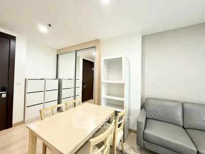 Modern living room with sleek furniture and ample storage space