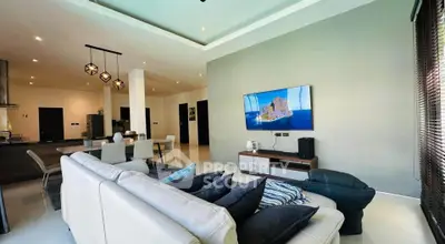 Spacious modern living room with open kitchen and stylish decor