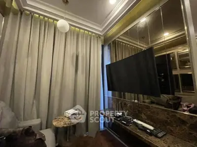 Luxurious living room with elegant decor and modern TV setup