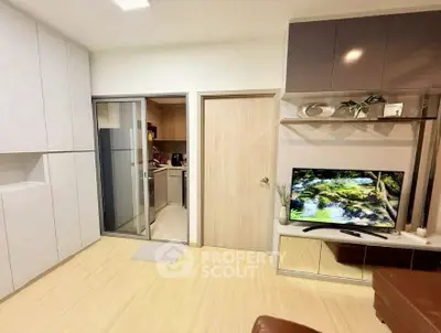 Modern living room with sleek design and integrated kitchen view