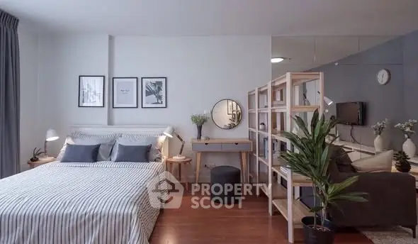 Stylish modern bedroom with cozy decor and open layout