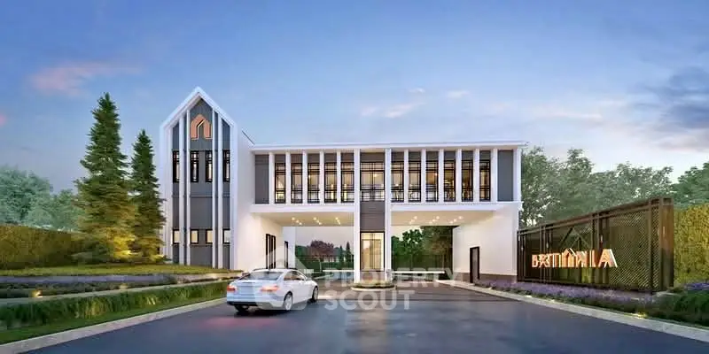 Modern luxury residential entrance with sleek architecture and landscaped surroundings.
