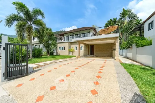 Stunning modern home with spacious driveway and lush greenery, perfect for luxury living.