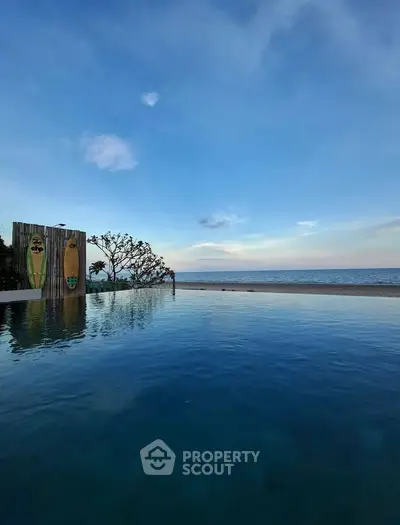 Stunning infinity pool with ocean view at luxury beachfront property