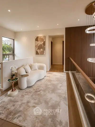 Luxurious modern living area with plush seating and elegant lighting, perfect for relaxation and style.