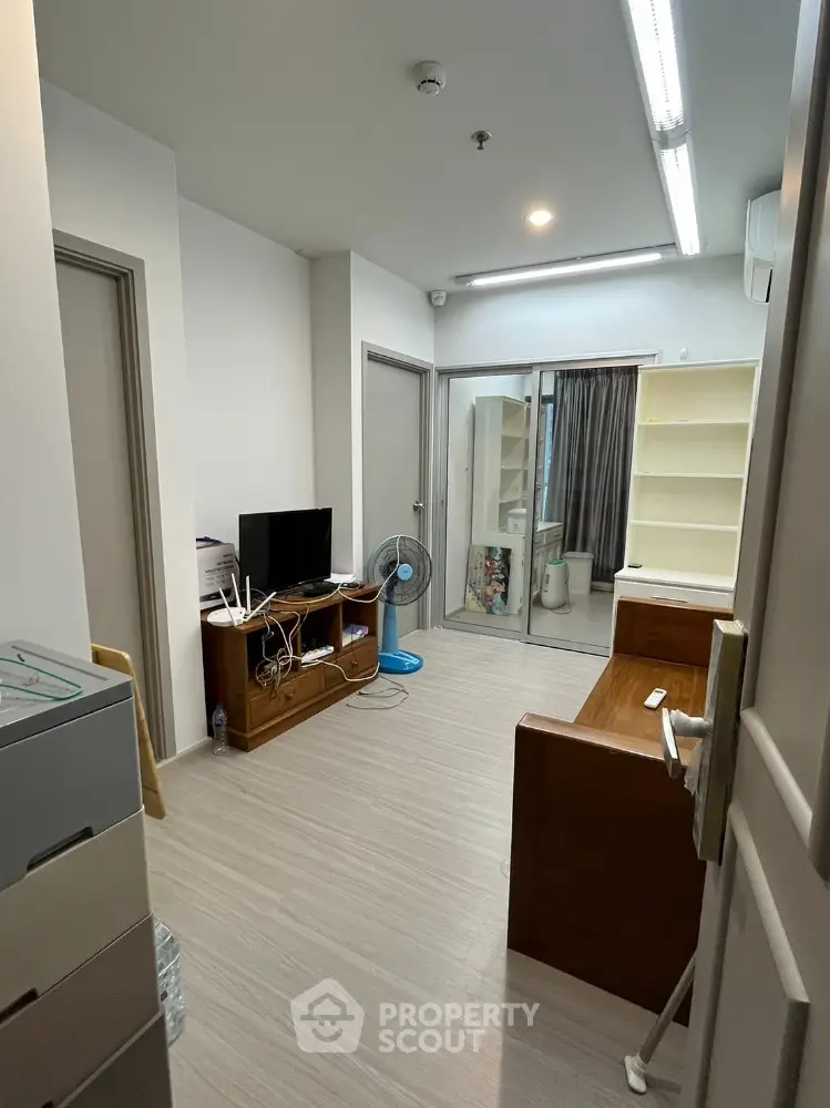 Modern apartment interior with wooden furniture and open layout