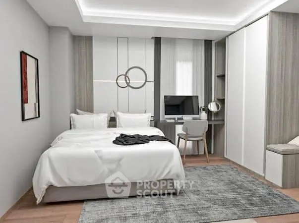 Modern bedroom with stylish decor and workspace, featuring a cozy bed and elegant furnishings.