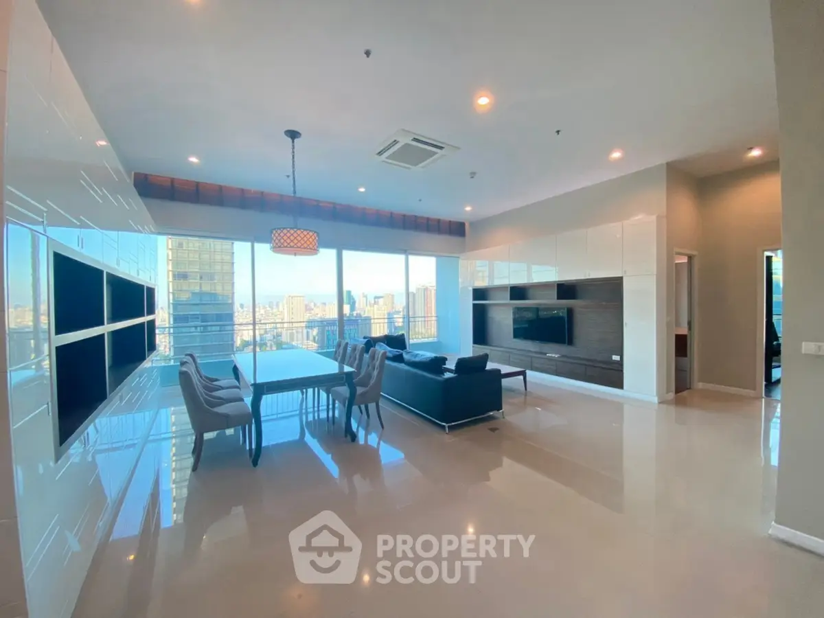 Spacious modern living room with city view and elegant dining area