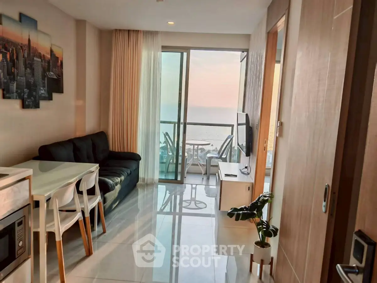 Modern living room with ocean view balcony and stylish decor