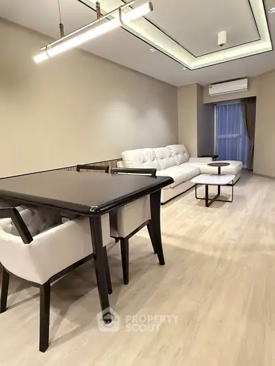 Modern living room with elegant furniture and stylish lighting