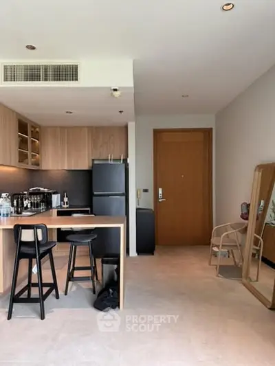 Modern kitchen with open layout and stylish wooden cabinetry