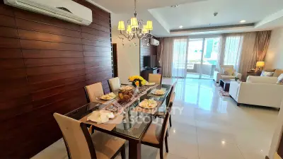 Spacious dining and living area with elegant decor and natural light
