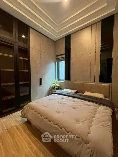 Luxurious modern bedroom with elegant design and cozy ambiance