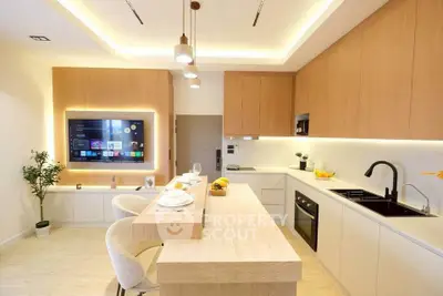 Modern kitchen with sleek design, open layout, and integrated appliances