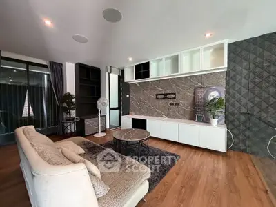Modern living room with stylish decor and cozy seating area