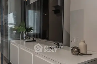 Modern living room with sleek TV setup and stylish decor