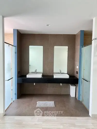 Modern bathroom with dual sinks and sleek design