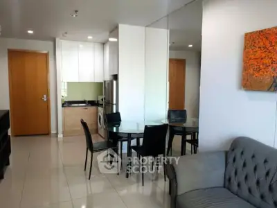 Modern living room with dining area and kitchen in open layout apartment