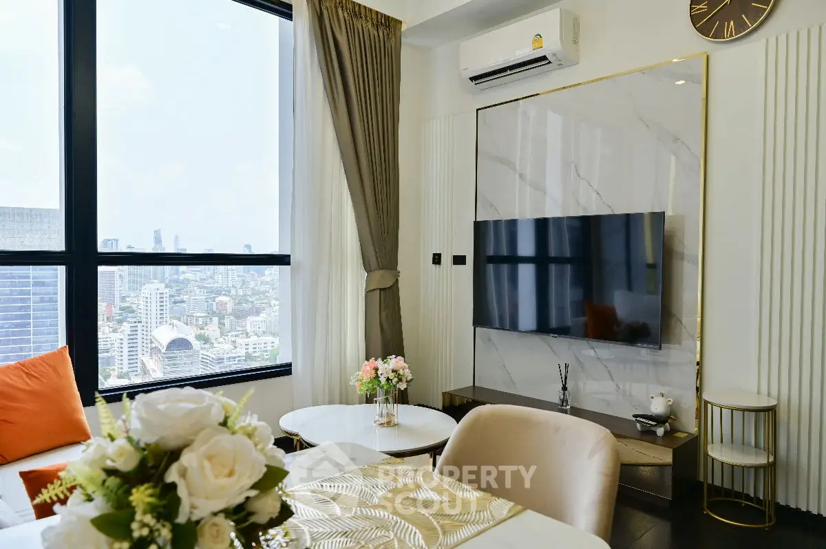 Modern living room with city view, stylish decor, and elegant furniture