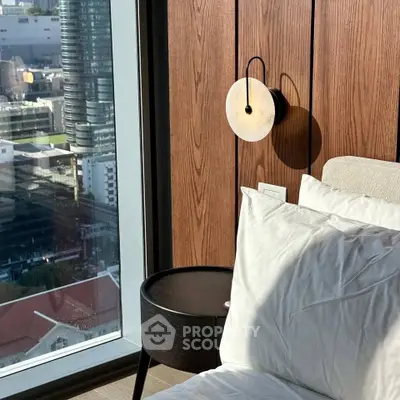 Luxurious bedroom with stunning city view and elegant wooden wall paneling.