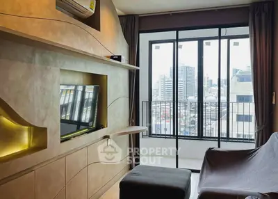 Modern living room with stylish built-in TV unit and city view balcony