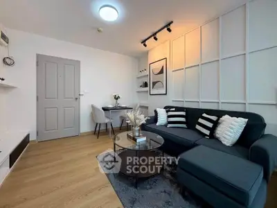 Modern living room with stylish decor and cozy seating area