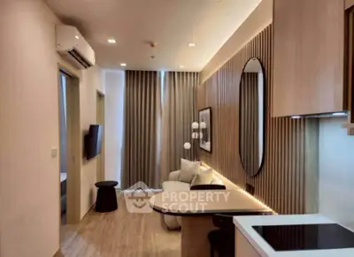 Modern living room with stylish decor and open kitchen layout