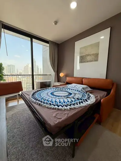 Modern bedroom with city view and stylish decor in urban apartment