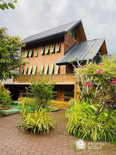 Stunning wooden house with lush garden and modern design, perfect for nature lovers.