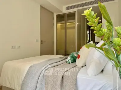 Modern bedroom with stylish decor and cozy ambiance