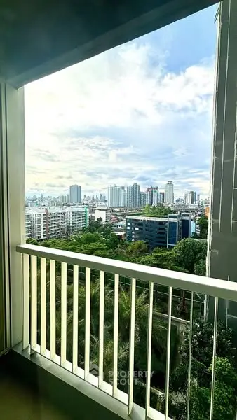 Stunning cityscape view from a high-rise balcony, perfect for urban living enthusiasts.