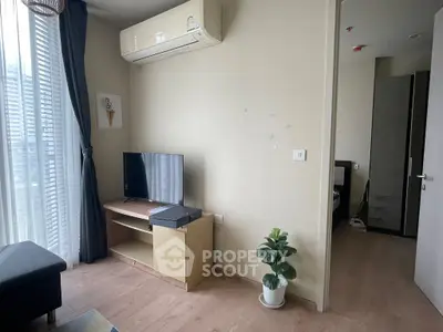 Modern living room with air conditioning and natural light