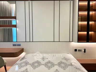 Modern bedroom with elegant decor and stylish wooden accents