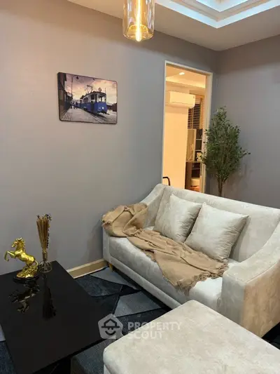 Cozy living room with elegant decor and modern lighting