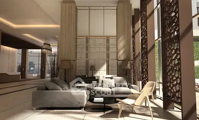 Luxurious modern living room with elegant decor and ample natural light.