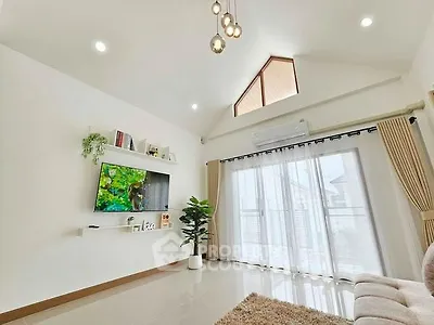 Bright and airy living room with modern decor and large windows