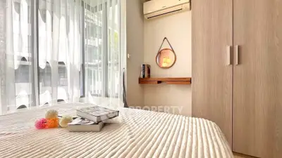 Cozy bedroom with modern decor and natural light