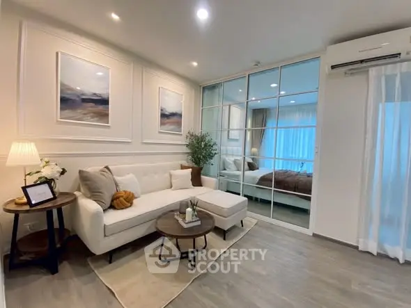 Modern living room with elegant decor and cozy seating area