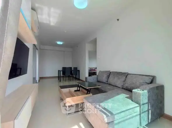 Modern living room with sleek furniture and natural light